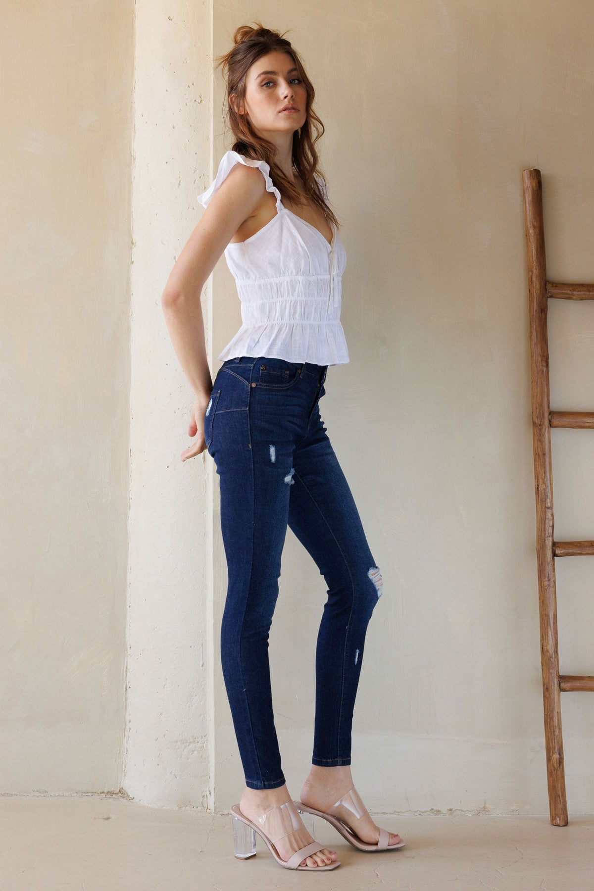 Mid Rise Destructed Skinny Jeans