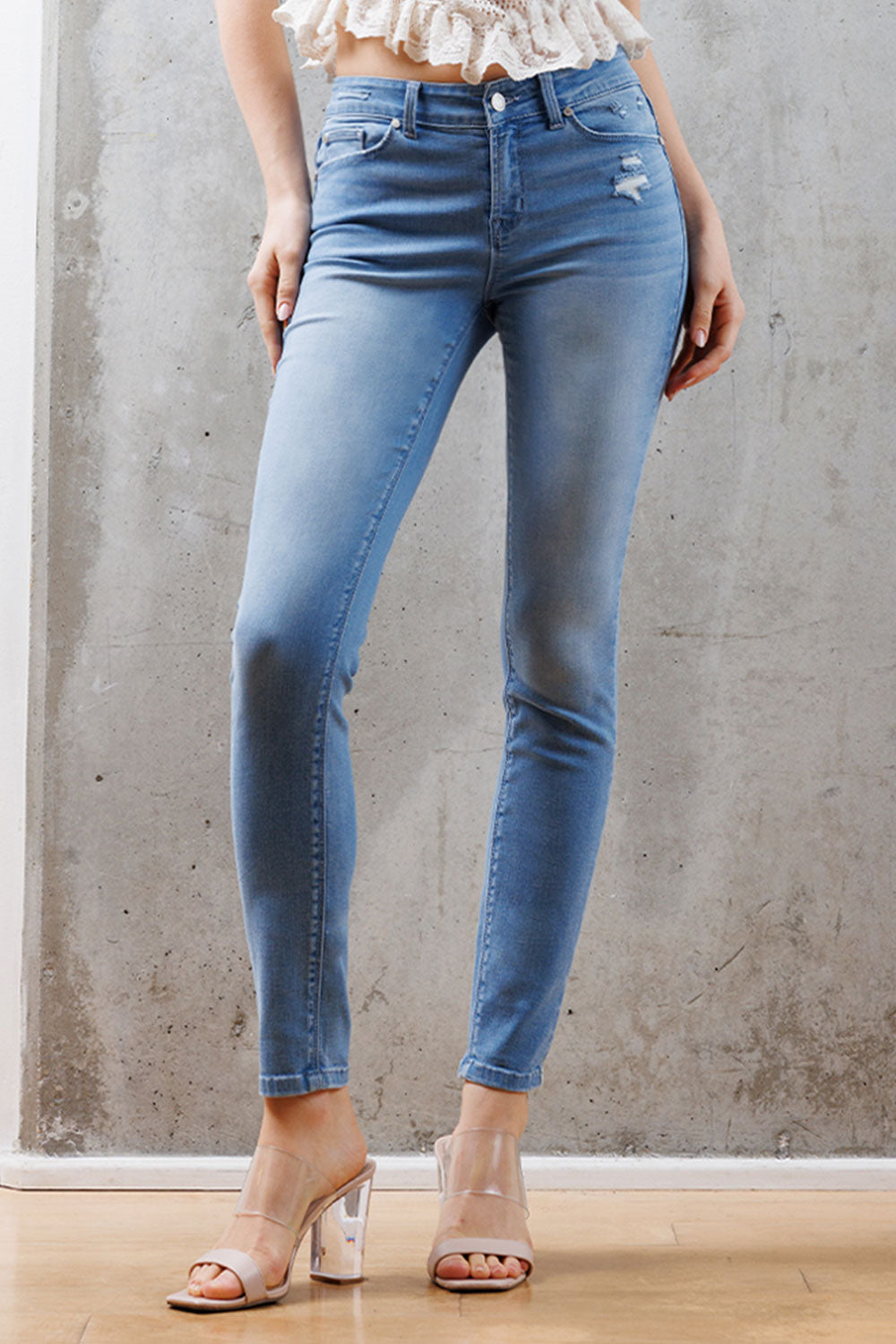 Mid Rise Destructed Skinny Jeans