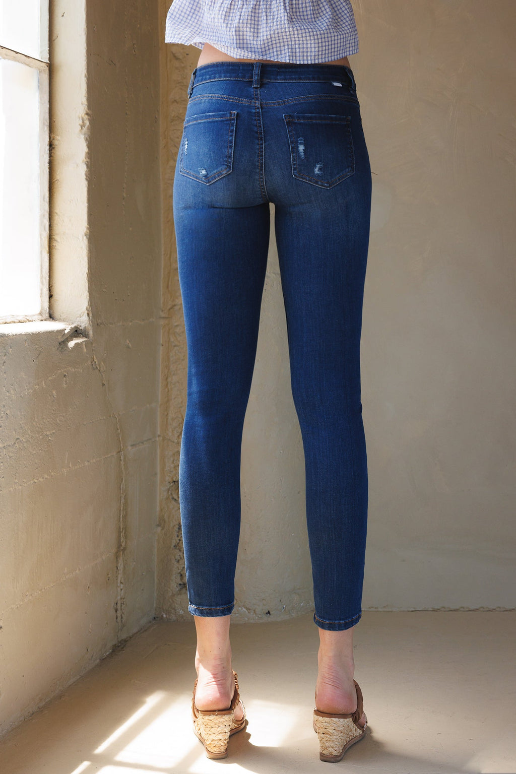 Mid Rise Destructed Ankle Skinny Jeans