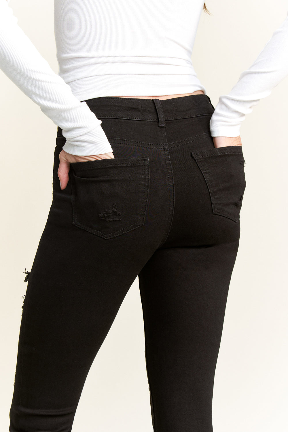 High Rise Destructed Skinny Jeans