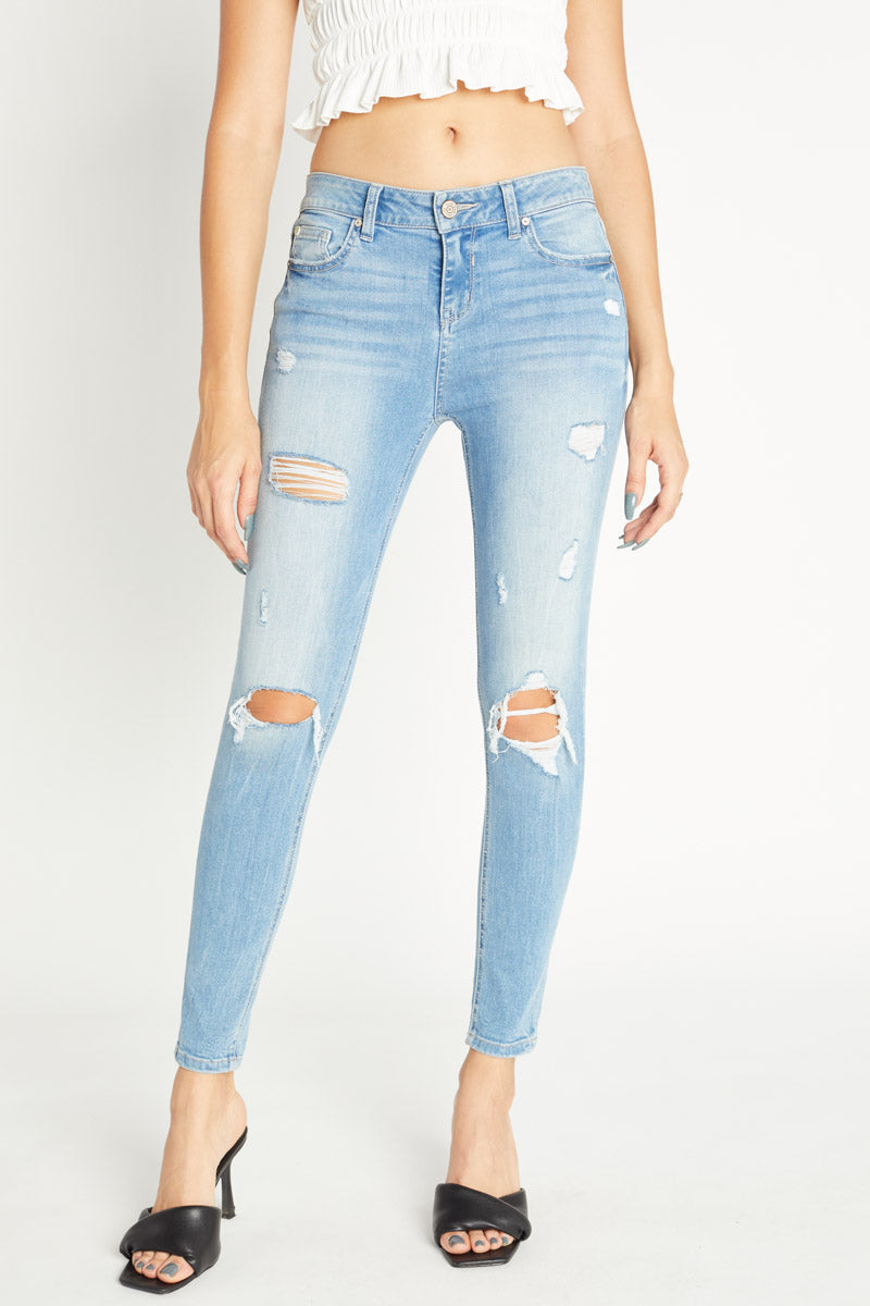 Distressed Mid Rise Ankle Skinny Jeans