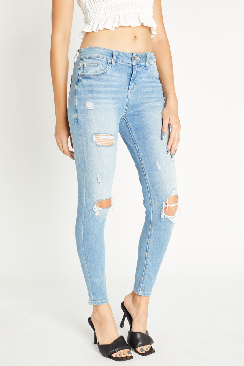 Distressed Mid Rise Ankle Skinny Jeans