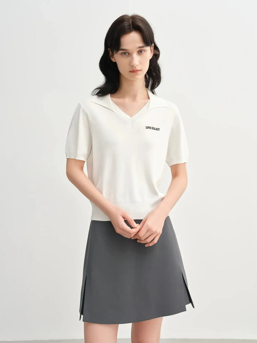 Women's Curve-Flattering Knit Top with Structured Collar