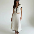 Elegant White Crop Top & Pleated Skirt Set
